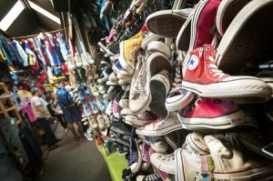 48530968 - old converse trainers at chatuchak market, bangkok